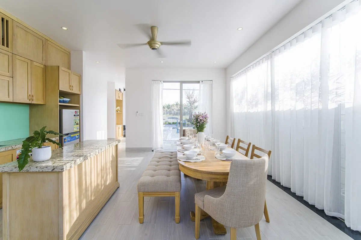 Best Luxury Stays in Hoi An: Heritage & Villas 2026 2 The Manor bedroom — luxury villa accommodation in Hoi An