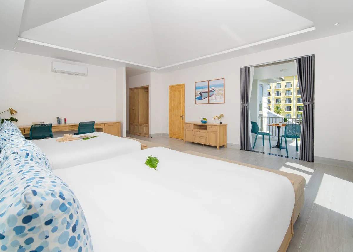 Best Luxury Heritage Hotels in Hoi An 2025 Guide 2 The Manor bedroom — luxury villa accommodation in Hoi An
