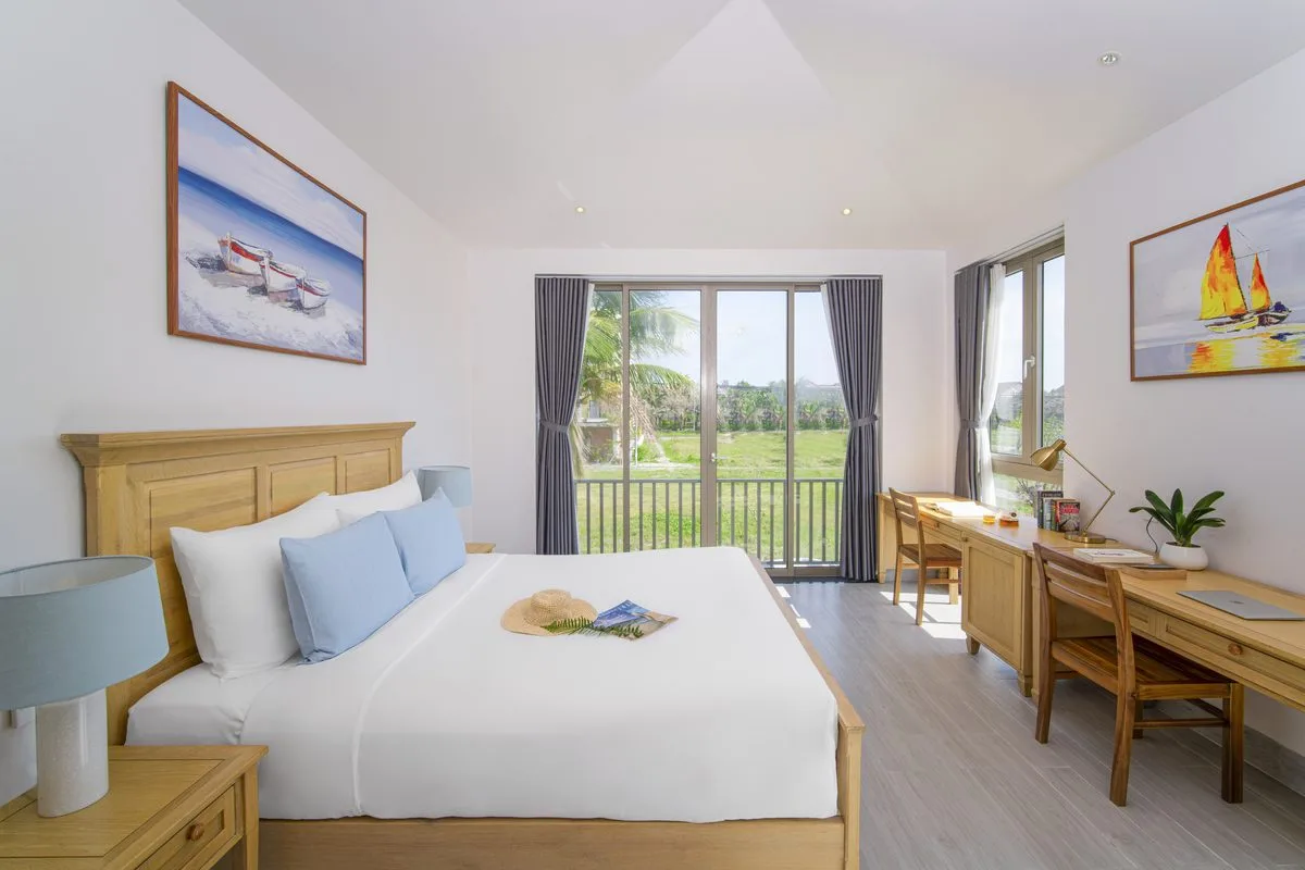The Manor Hoi An: Luxury 4-Bedroom Country Beach Villa (2026) 2 The Manor bedroom — luxury villa accommodation in Hoi An